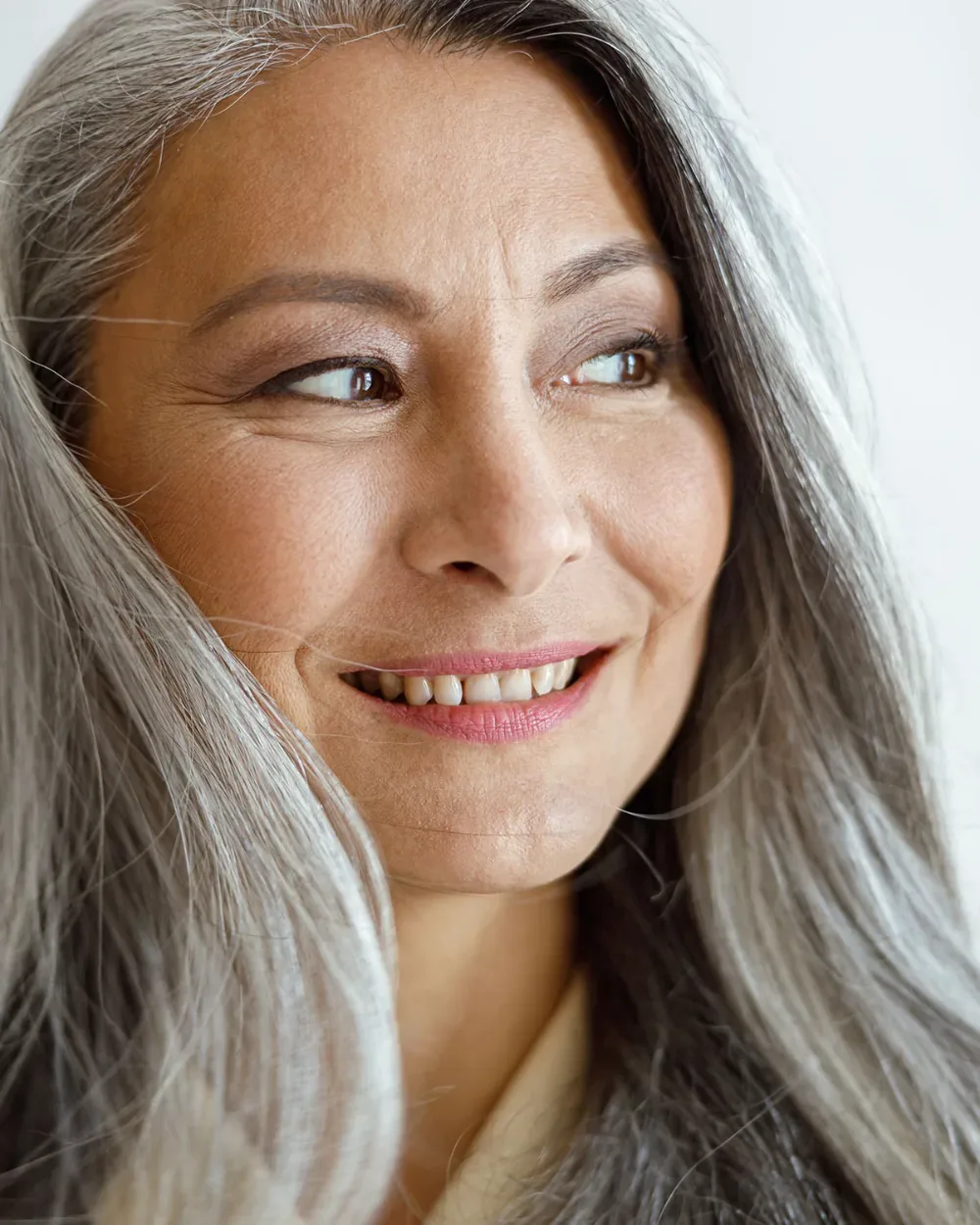 Long natural gray hair, conditioned and styled